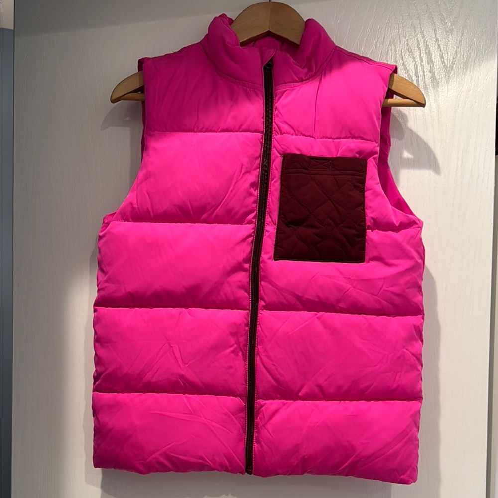 Girls XL 14/16 Pink Puffer Vest with maroon colored Pocket. Never worn